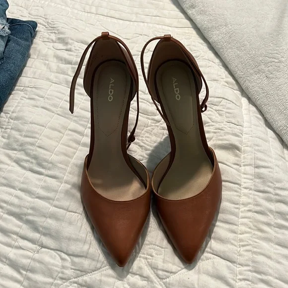 Brown Aldo High heels, size but runs I’m a size and they fit  perfect